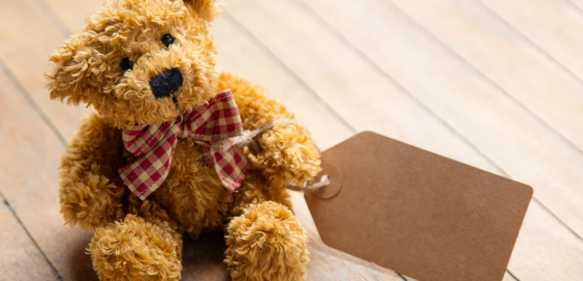 Custom plush toy safety label and tush tag with retail packaging for brand merchandise